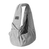 A gray pet carrier sling bag featuring a plaid fabric lining, shown flat.