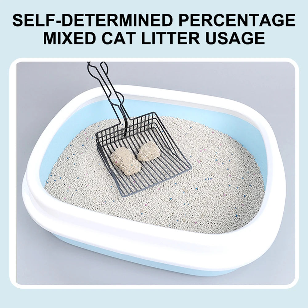 A white litter box filled with light gray cat litter and a wire scoop, demonstrating self-determined percentage mixed cat lit