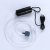 A black portable USB aquarium air pump with a clear tube and a small gray accessory is shown on a white background.