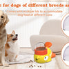 A yellow interactive treat dispenser for dogs is shown next to a golden retriever and a small dog, with various lids displaye