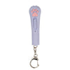 A purple pet laser pointer toy with a paw print design and a metal clip.