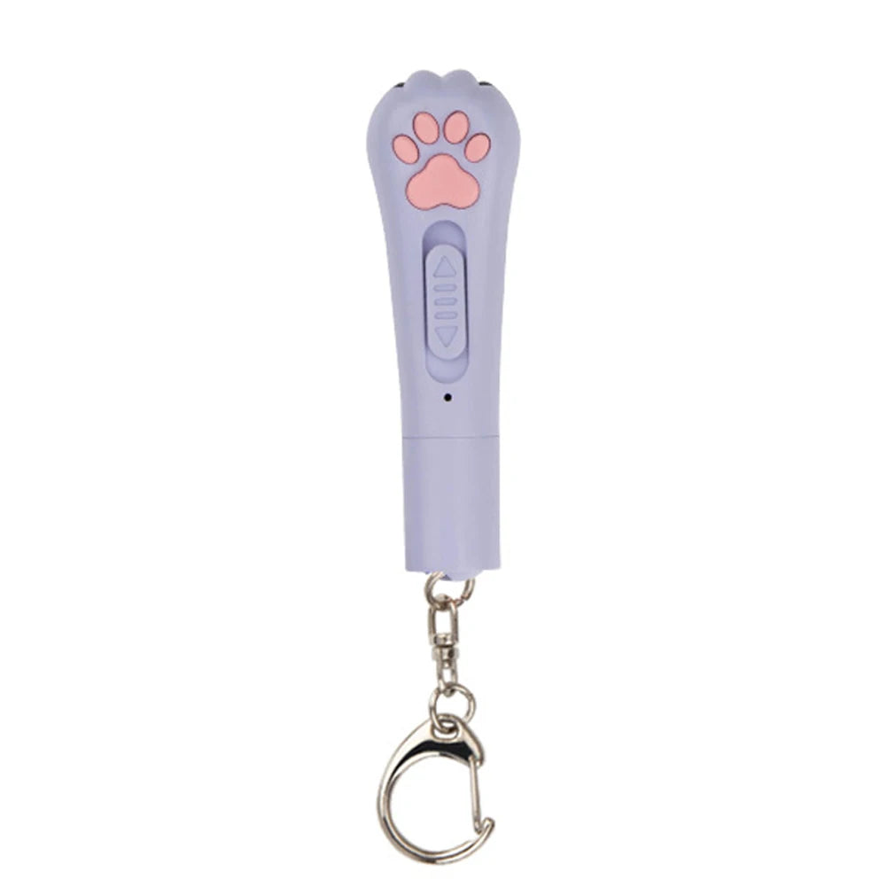 A purple pet laser pointer toy with a paw print design and a metal clip.