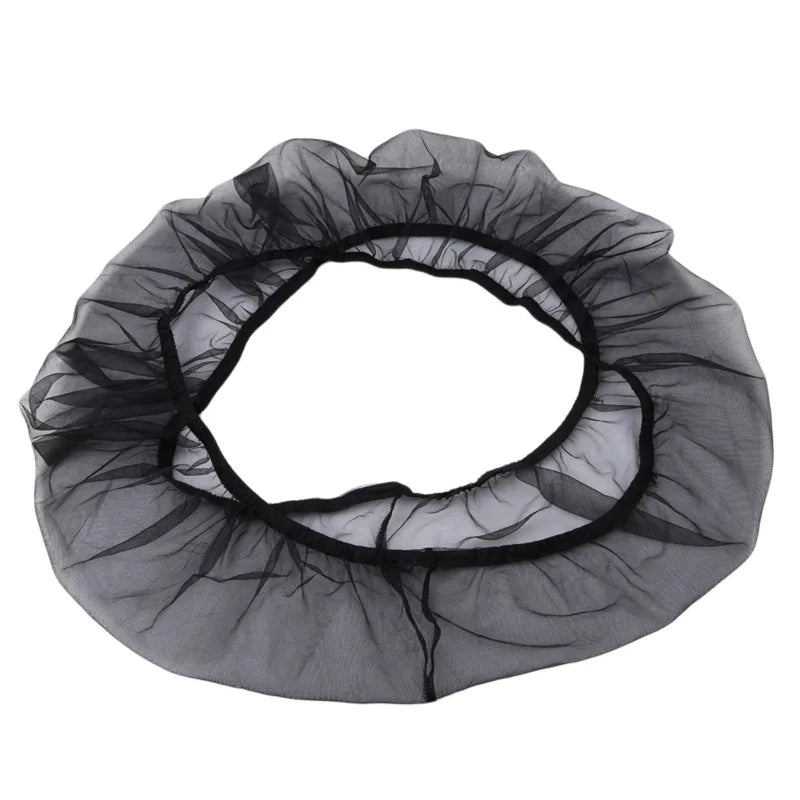 Black nylon mesh skirt designed as a debris guard for bird cage seed catchers