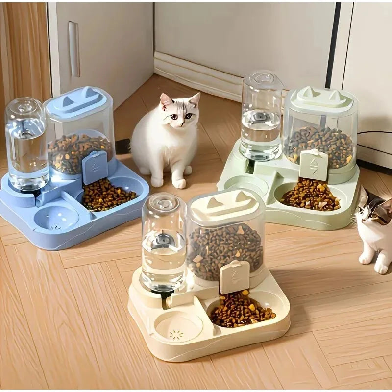 A white cat is standing next to a 2-in-1 automatic pet feeder with separate compartments for water and dry food.
