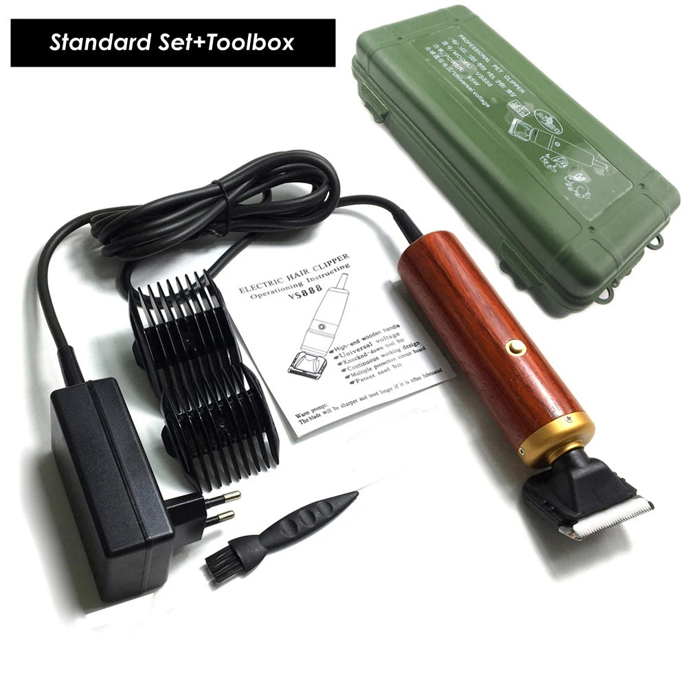A professional corded pet clipper set including a clipper, power cord, and accessories in a green toolbox.