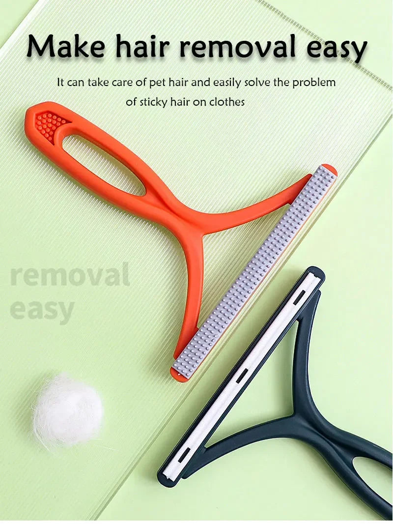 A set of orange and black grooming tools, including a silicone comb and a plastic tool, used for removing pet hair from cloth