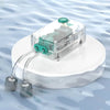 A clear plastic aquarium air pump with adjustable flow is shown resting on a white platform.
