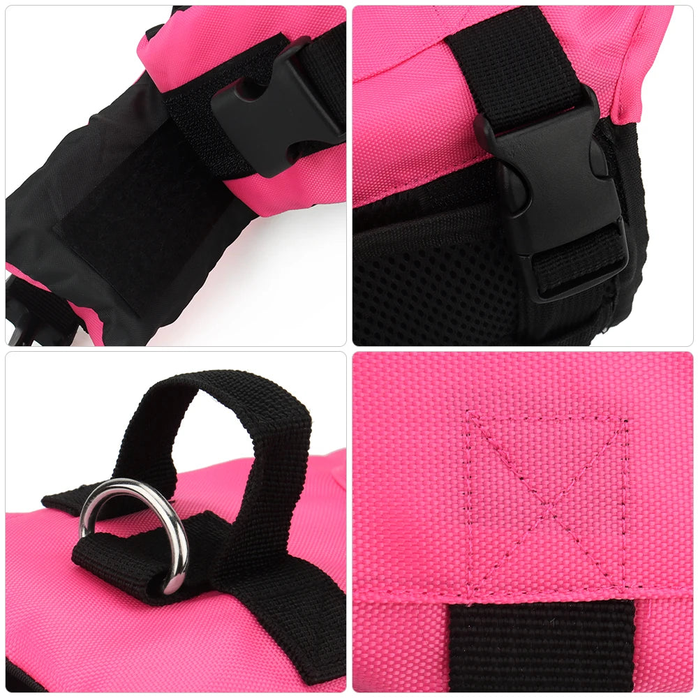 Close-up view of a black and pink waterproof dog life vest or jacket with adjustable straps and a silver ring.