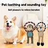 A fluffy dog is sitting next to a plush bone dog squeaky chew toy for pet teething and sound relief.