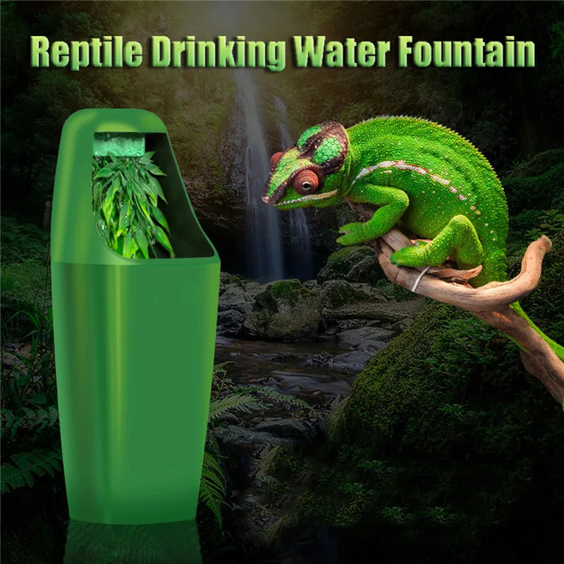 A green reptile drinking water fountain features a frog-like lizard perched on a branch near flowing water.