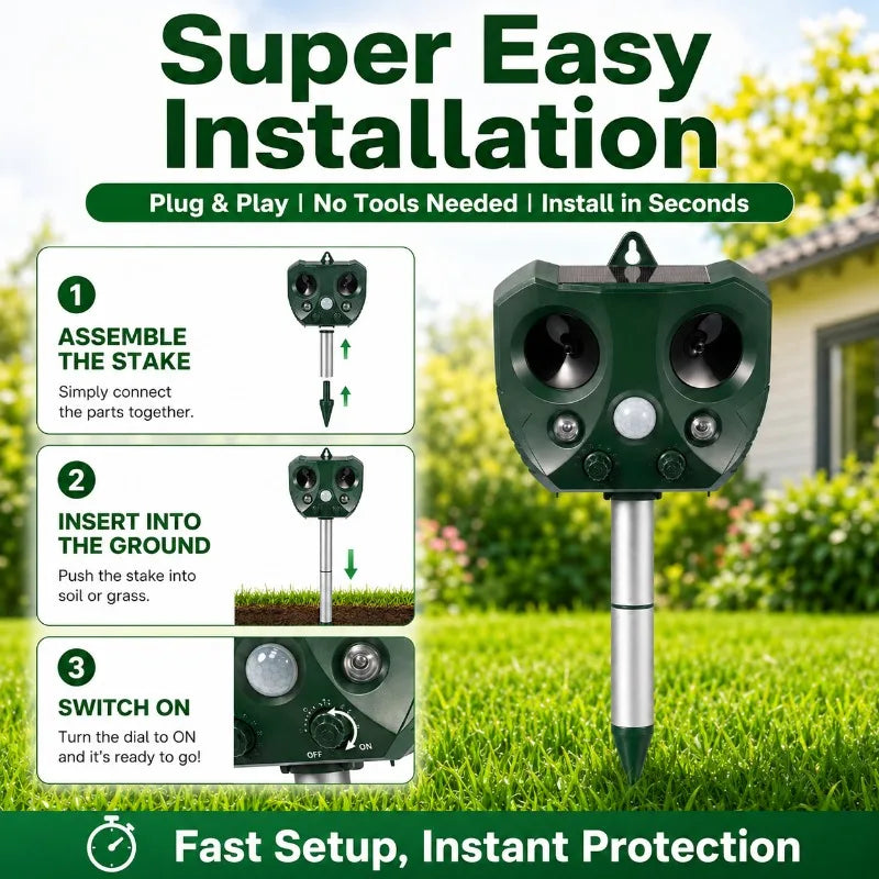 A green solar ultrasonic animal repeller stake with a motion sensor is shown in a grassy outdoor setting.