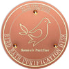 A round copper disc for bird bath purification featuring a silhouette of a bird.