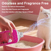 A hand sprays cat litter deodorizer beads into a pink litter box, with a white cat nearby.