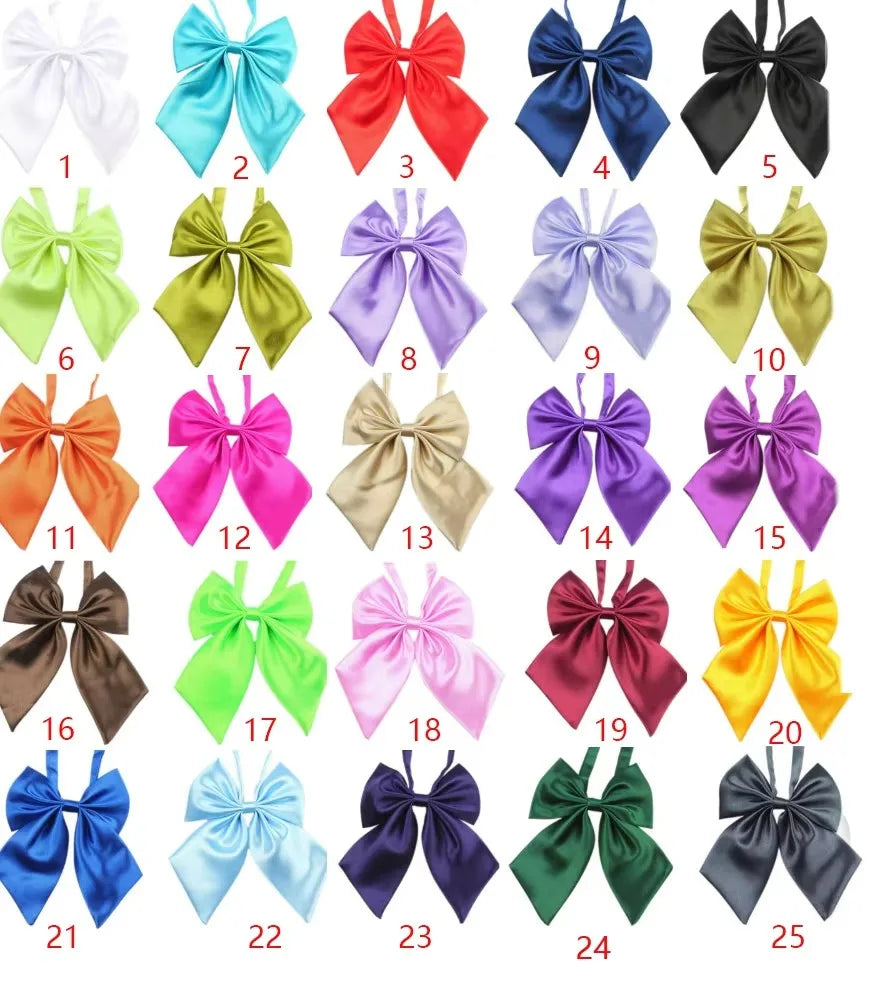 A collection of twenty-five colorful satin bow ties in various shades including pink, purple, green, yellow, and black for pe