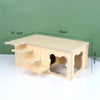 A natural wooden hamster house with an activity platform and various nesting areas.