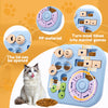 A blue interactive dog puzzle toy with food compartments and a lid, shown next to a cat and loose kibble.