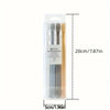 A clear plastic package containing a set of four soft-bristle travel toothbrushes.