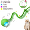 A green automatic interactive cat toy ball with a flexible tail and USB connection, shown next to a cat.