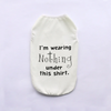 A white breathable summer pet vest with black text that reads I'm wearing Nothing under this shirt.