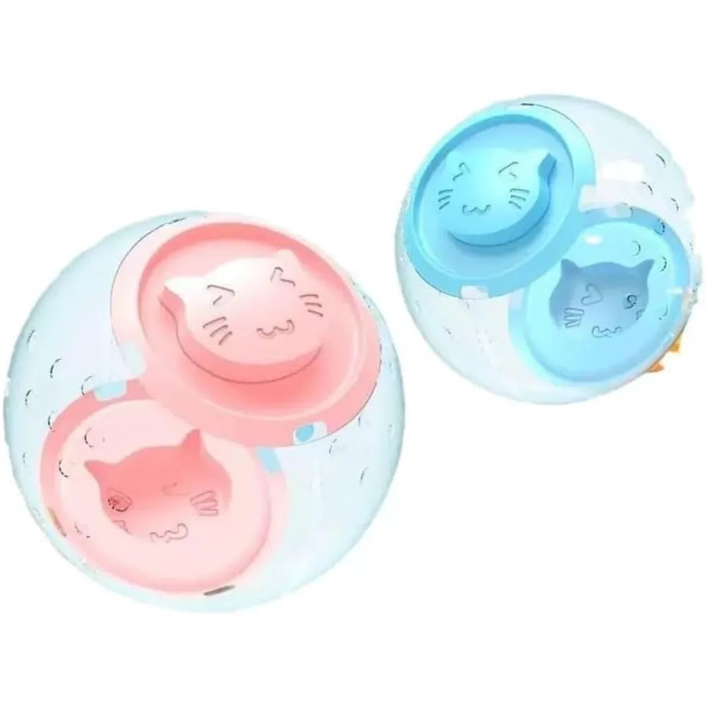 A clear silicone ball with a cat face design, featuring pink and blue sections for hamster exercise and play.