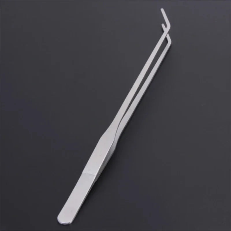 Stainless steel aquarium cleaning tweezers shown diagonally against a dark background.