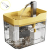 A yellow automatic USB cat water fountain with a stainless steel spout is shown pouring water into a clear container.