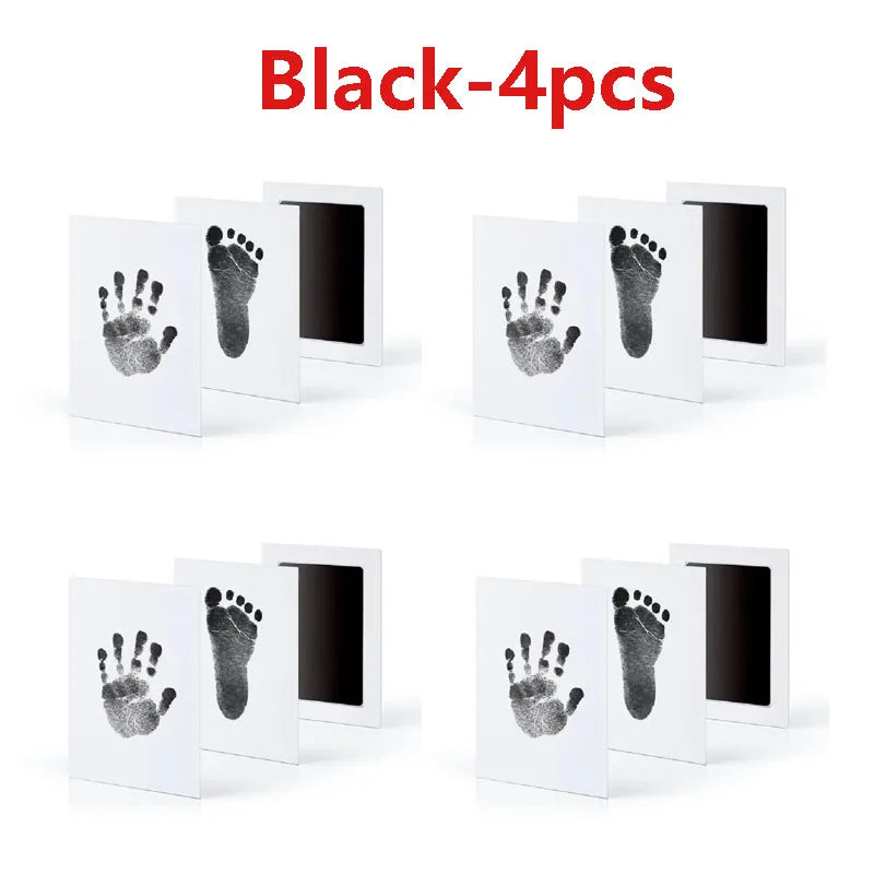 Black baby handprint and footprint kits shown in four separate cards.
