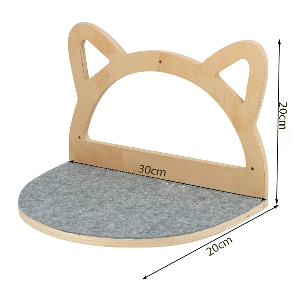 Light wood wall-mounted cat climbing shelf with a hammock and scratching post