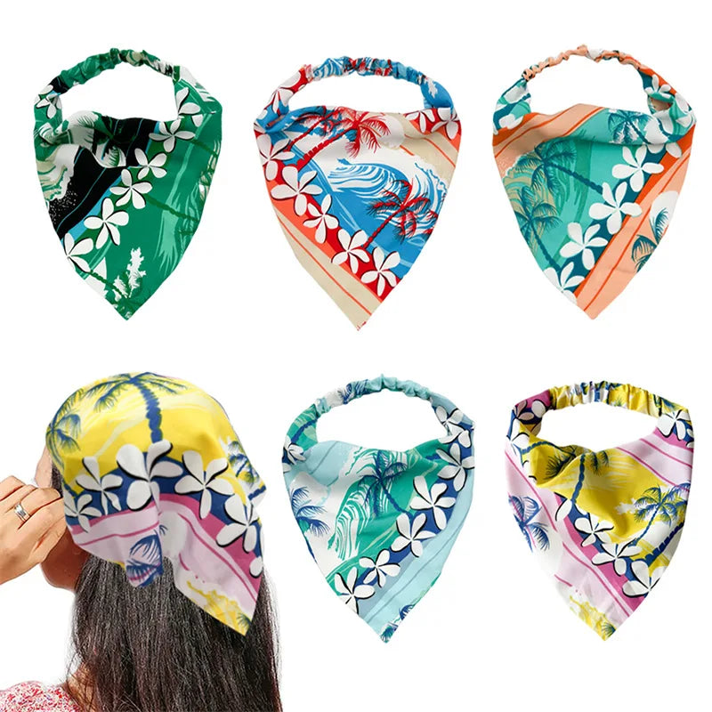 Un juego de cuatro pañuelos elásticos para el cabello con estampado floral boho, hojas tropicales y colores vibrantes.