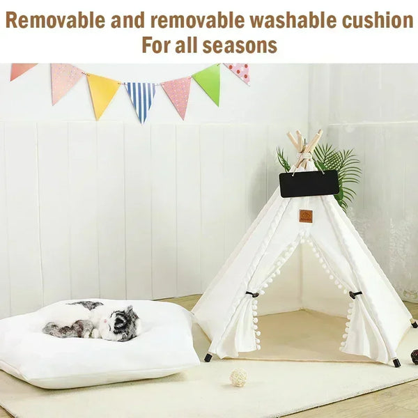 A white teepee pet tent with a removable cushion and blackboard decoration for pets.