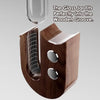 A glass jar fits perfectly into a wooden groove, demonstrating the fit of the Pet Whisker Collector Vase.