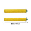 A long, cylindrical natural wooden perch stand for parrots and birds with a yellow glitter finish.