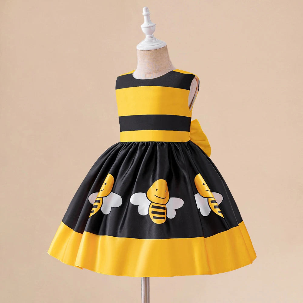 Robe tutu rayée jaune et noir pour filles, présentée sur une mannequin.