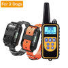 A black waterproof remote dog training collar with an orange strap and a digital display showing 00.
