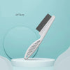 A white pet hair removal slicker brush with a black bristled head is displayed on a light blue background.