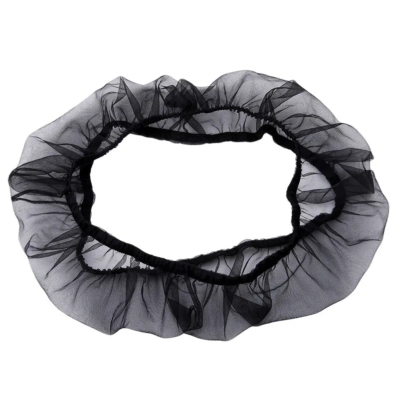 Black breathable nylon mesh bird cage seed guard with a ruffled, circular design