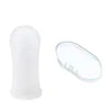 A white silicone pet toothbrush is shown next to a translucent oval brush.