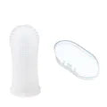 A white silicone pet toothbrush is shown next to a translucent oval brush.