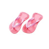Ein Paar rosa herzförmige Kau-Slipper für Welpen.