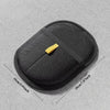 A black reusable pet grooming glove for shedding cats and dogs with a yellow clasp.