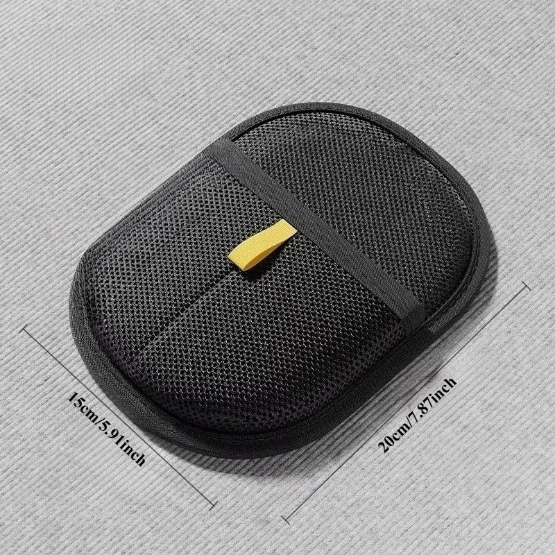 A black reusable pet grooming glove for shedding cats and dogs with a yellow clasp.