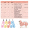 A collection of pink, yellow, and blue hooded pet bathrobes for dogs and cats displayed next to a dog wearing a pink bathrobe