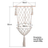 Macrame cat hammock bed for pet decor made of beige rope with tassels