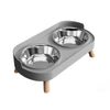 A gray stainless steel double bowl for dogs and cats with wooden handles.