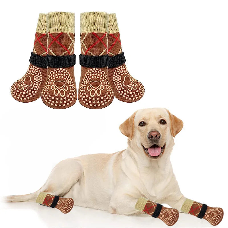A pack of four anti-slip dog traction socks in brown and tan colors displayed next to a golden retriever.