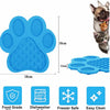 Blue silicone pet licking mat with suction cups for dogs and cats featuring a triangular shape and various cleaning features