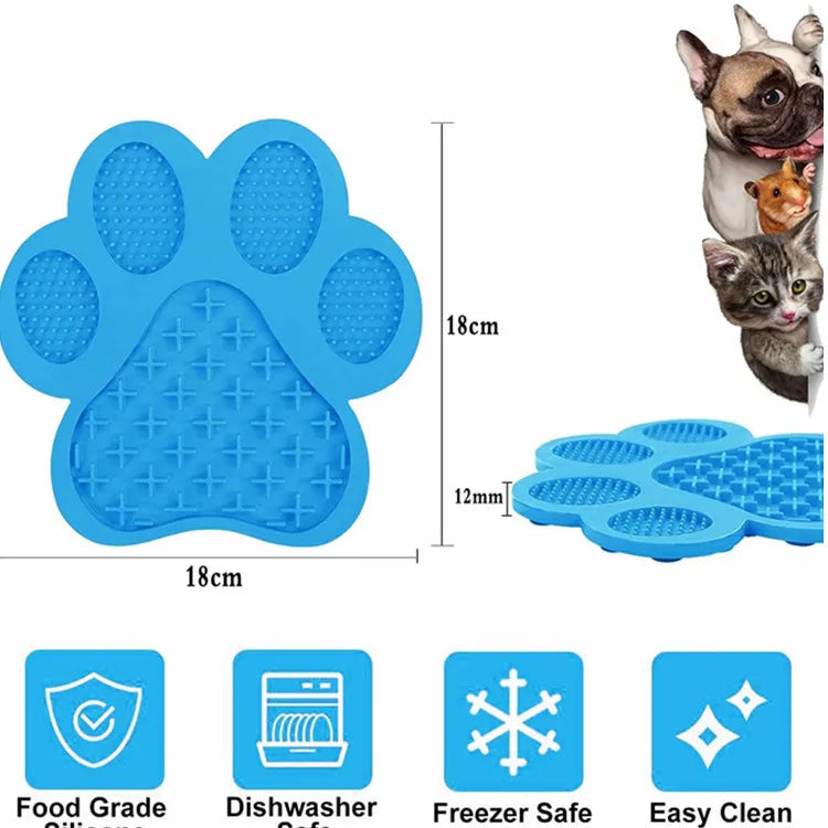 Blue silicone pet licking mat with suction cups for dogs and cats featuring a triangular shape and various cleaning features