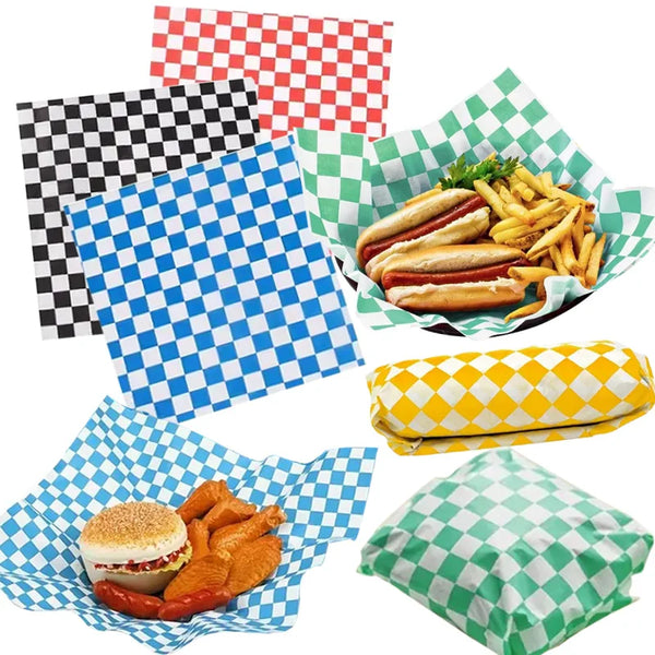 A collection of colorful checkerboard oil-proof sandwich wrapping paper sheets and prepared food items like sausages and fren