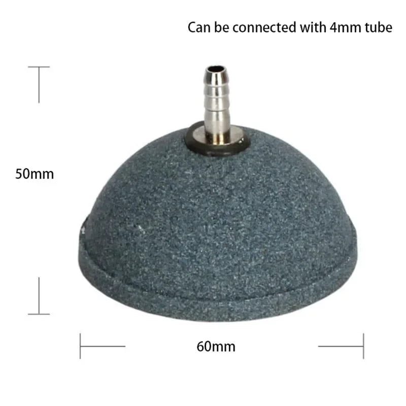 A grey, disc-shaped aquarium air stone with a connection point for a 4mm tube.
