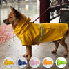 A golden dog wearing a yellow waterproof reflective raincoat outdoors, with several color options displayed below.